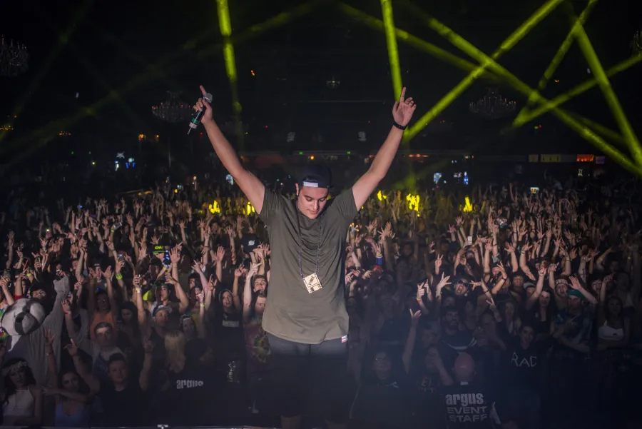 VINNIE on stage in front of a sold-out crowd