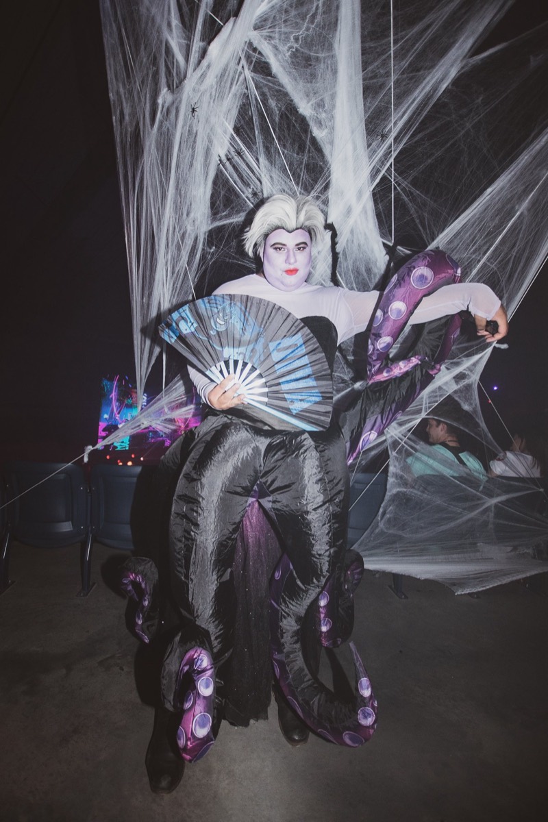 Sea witch with inflatable tentacles and a folding fan holds court at Coloween — Denver Halloween nightlife