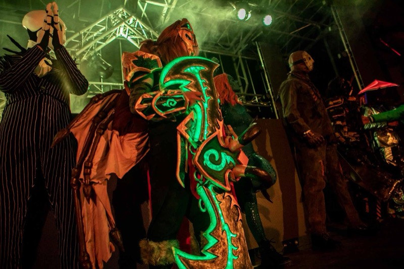 Jack Skellington and a glowing green war-axe share the contest stage at Colorado's biggest adult Halloween party
