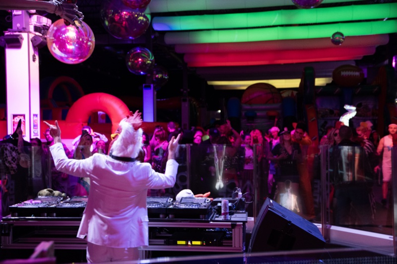 Hands up at the booth, hands up on the floor at the Coloween costume contest in Denver