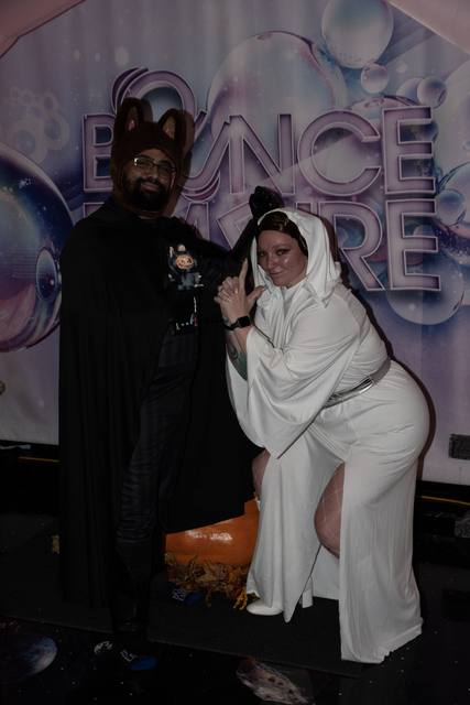 Adults in Halloween costumes at Coloween 2025, Bounce Empire, Lafayette, Colorado